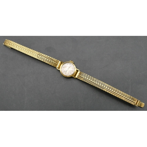 421 - An 18ct gold ladies' Bucherer with matching strap bracelet, 16.6 grams without movement