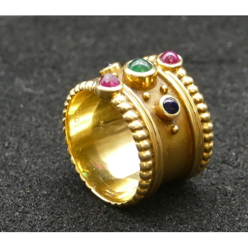 432 - A heavy 18ct gold wide band wedding ring, inset with emerald, 2 rubies and 2 sapphires, Size N/O, 11... 