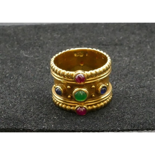 432 - A heavy 18ct gold wide band wedding ring, inset with emerald, 2 rubies and 2 sapphires, Size N/O, 11... 