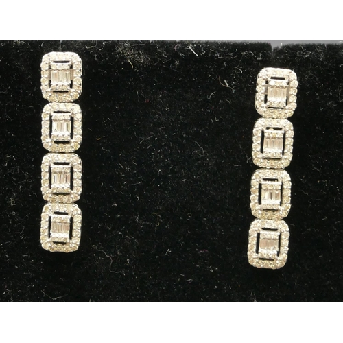 435 - A pair of 18ct white gold 4-sectioned drop earrings, mounted with various diamonds, 3.2cm high, 5.4 ... 