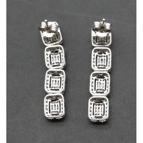 435 - A pair of 18ct white gold 4-sectioned drop earrings, mounted with various diamonds, 3.2cm high, 5.4 ... 