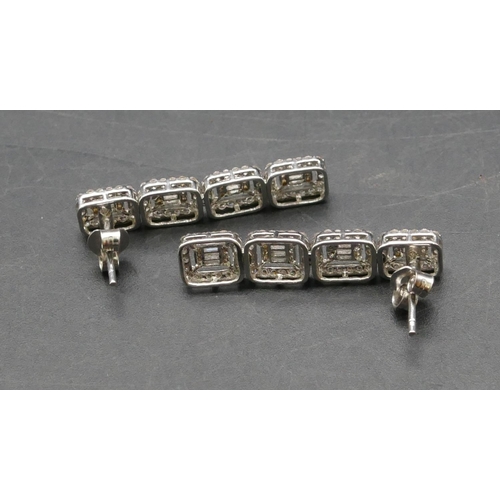 435 - A pair of 18ct white gold 4-sectioned drop earrings, mounted with various diamonds, 3.2cm high, 5.4 ... 