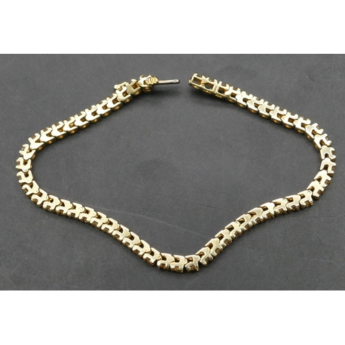 436 - A 14ct gold tennis bracelet set with 55 diamonds each approx. 0.08 carat, 17.5cm long, 10.5 grams gr... 