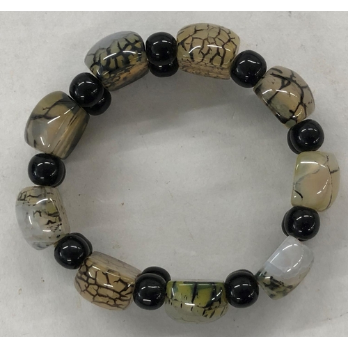 437 - A hardstone expanding bracelet