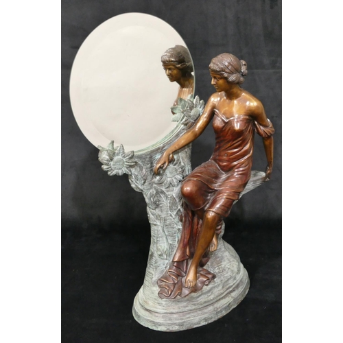 456 - A good quality reproduction bronze of a seated lady next to a circular mirror with allover raised fl... 