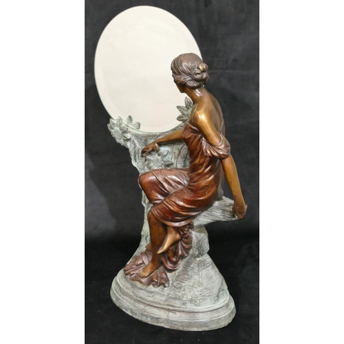 456 - A good quality reproduction bronze of a seated lady next to a circular mirror with allover raised fl... 