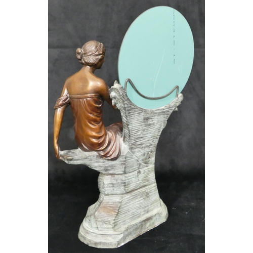 456 - A good quality reproduction bronze of a seated lady next to a circular mirror with allover raised fl... 