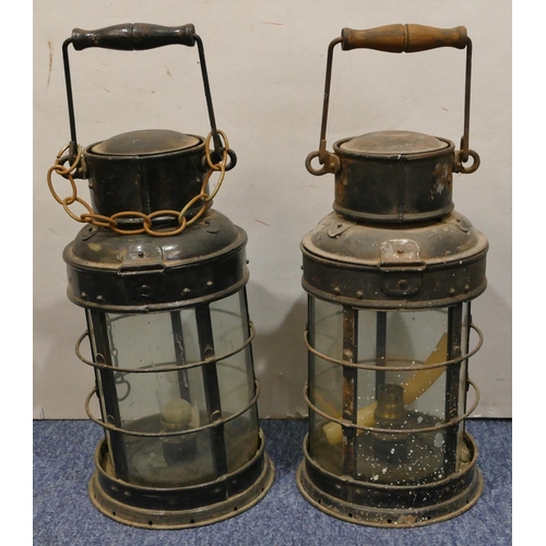 459 - 2 black painted metal circular lanterns with swing overhead handles, 34.5cm high