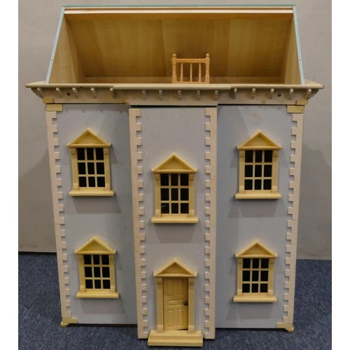 471 - A modern doll's house with detachable roof and double hinged front with various accessories, 68cm hi... 