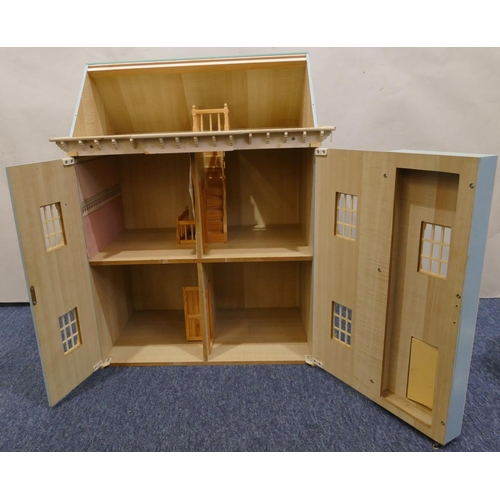 471 - A modern doll's house with detachable roof and double hinged front with various accessories, 68cm hi... 