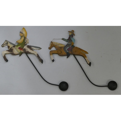 474 - 2 vintage painted metal balancing toys in the form of a Red Indian and Cowboy