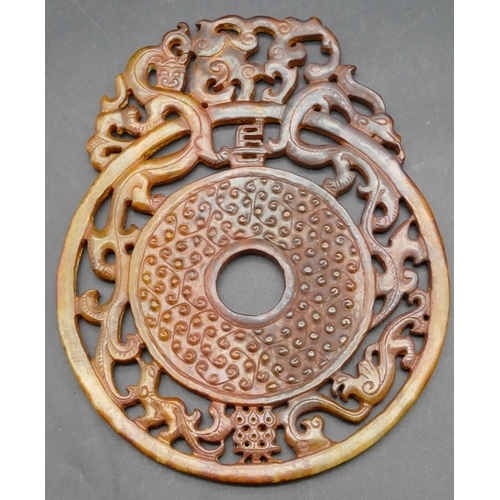 481 - A hardstone pierced panel with animal and scroll decoration, 17.7cm wide