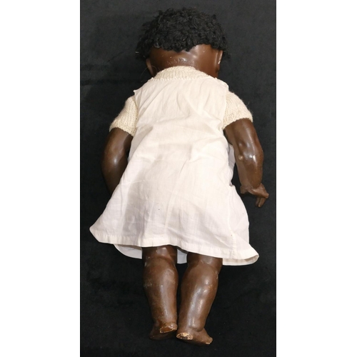 493 - A Heubach Koppelsdorf black bisque headed child's doll, 406-3, open eyes and mouth with jointed body... 