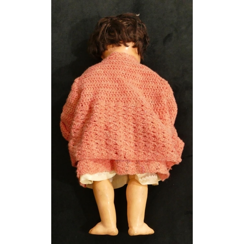 495 - Kammer & Reinhardt Celluloid child's doll with closable eyes and open mouth, jointed body, 44cm long... 