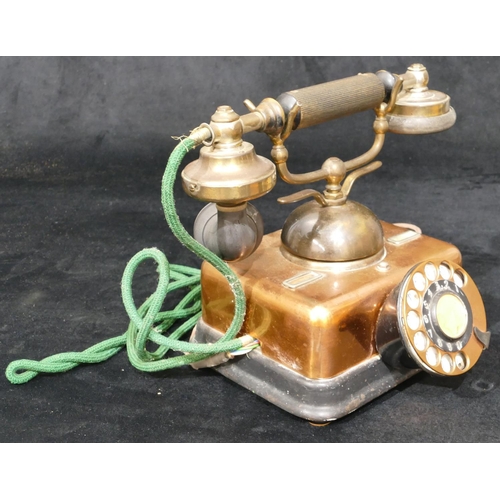 496 - A Danish vintage copper and brass telephone, stamped Kjobenhavns Telefon, 22cm high