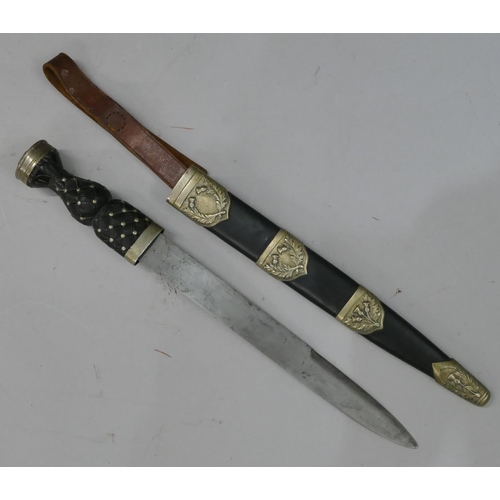 500 - A military Scottish dirk, blade stamped, with scabbard, 47cm long overall