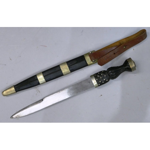 500 - A military Scottish dirk, blade stamped, with scabbard, 47cm long overall