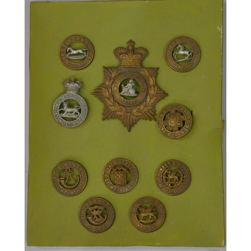 502 - 10 various military cap badges 