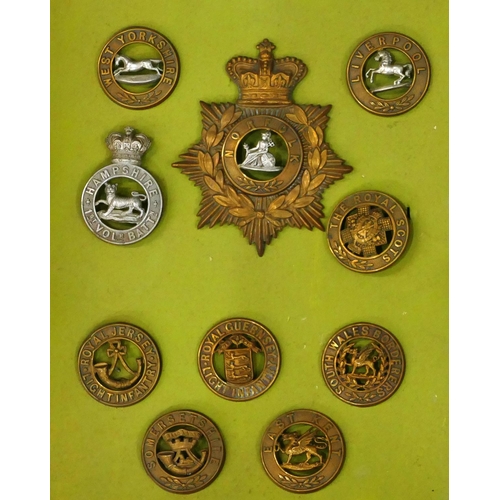 502 - 10 various military cap badges 