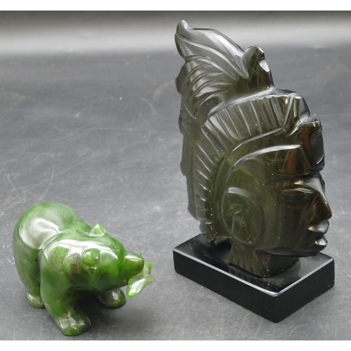 507 - A black hardstone Aztec style figurehead on rectangular shaped base, 13cm high, a green hardstone fi... 