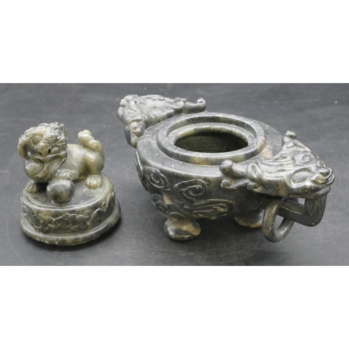 508 - An Oriental soapstone 2-handled bulbous shaped censer with cover and raised animal motif, 19.5cm wid... 