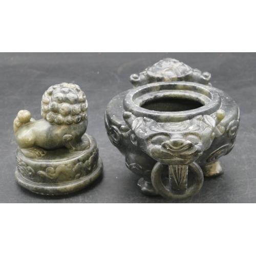 508 - An Oriental soapstone 2-handled bulbous shaped censer with cover and raised animal motif, 19.5cm wid... 