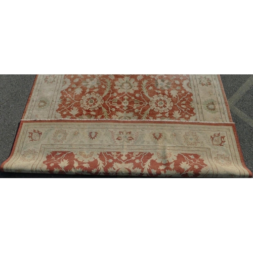 513 - A good quality modern Afghan Zeigler carpet on cream and red ground, 352cm x 271cm