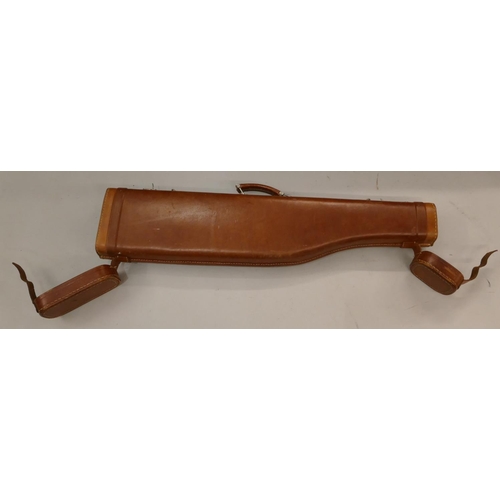 550 - A Brady canvas and leather gun case, 83.5cm long, also a leather Leg of Mutton shaped gun case, 78cm... 