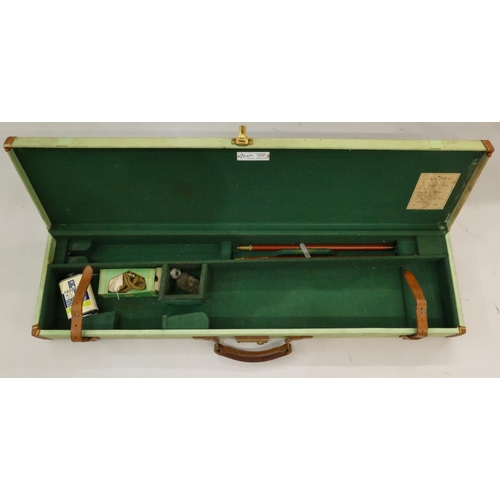 550 - A Brady canvas and leather gun case, 83.5cm long, also a leather Leg of Mutton shaped gun case, 78cm... 