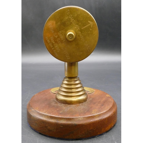 621 - A Trench Art novelty clock on round base inscribed 