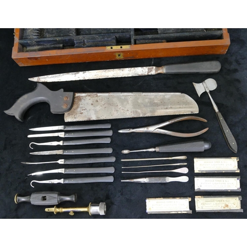 638 - A 19th Century mahogany cased field surgeon's amputation kit, comprising saw, scalpels etc. with ebo... 