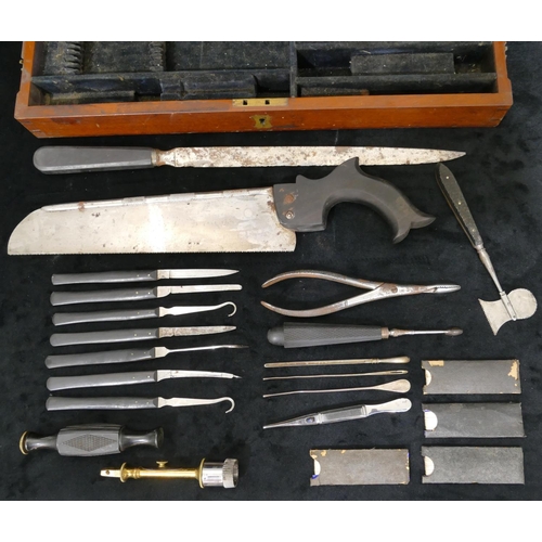 638 - A 19th Century mahogany cased field surgeon's amputation kit, comprising saw, scalpels etc. with ebo... 