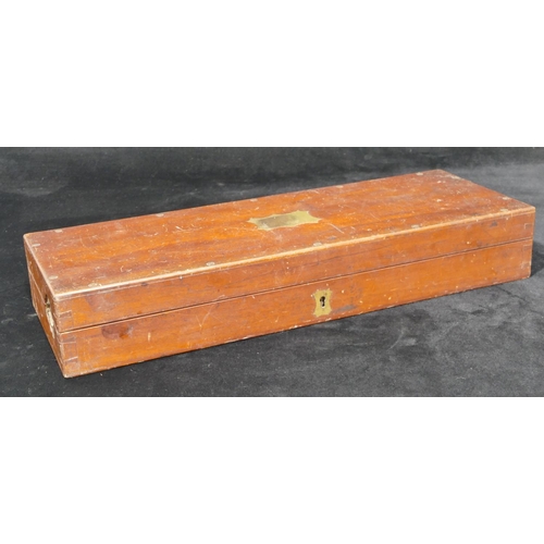 638 - A 19th Century mahogany cased field surgeon's amputation kit, comprising saw, scalpels etc. with ebo... 