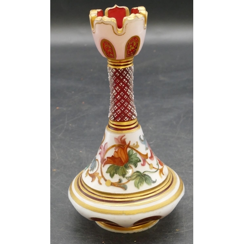 65 - A Venetian ruby and opaline round bulbous thin necked trumpet shaped vase with allover multicoloured... 