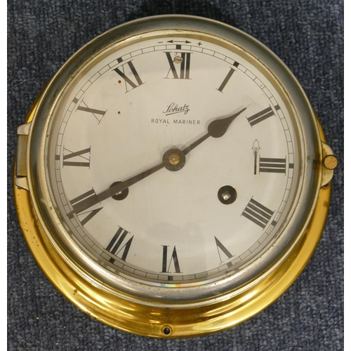 653 - Schatz gilt metal ship's wall clock with white enamel dial and Roman numerals, 18cm diameter