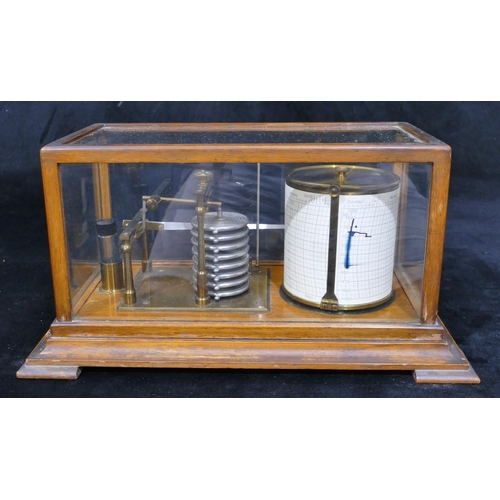 660 - A brass and oak barograph on splayed feet, 35cm wide