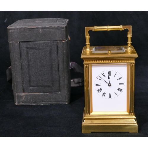 661 - A French brass repeat carriage clock striking on the half hour (stamped Patent Surety Poller), also ... 