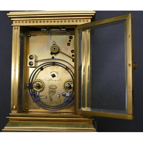 661 - A French brass repeat carriage clock striking on the half hour (stamped Patent Surety Poller), also ... 