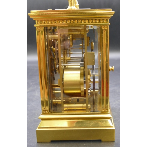 661 - A French brass repeat carriage clock striking on the half hour (stamped Patent Surety Poller), also ... 