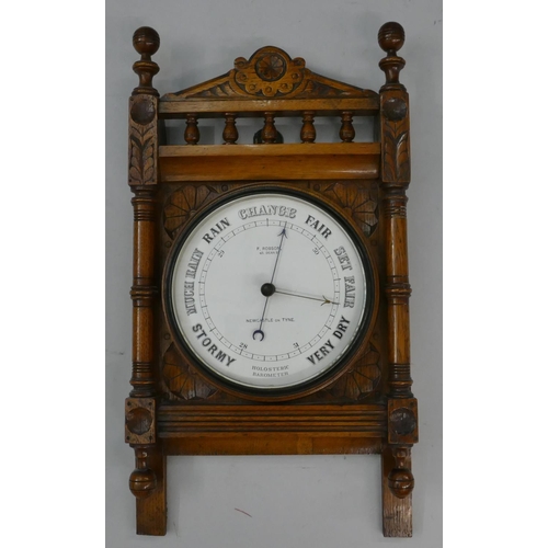 663 - F Robson, Newcastle on Tyne, holosteric oak hanging barometer with all over carved leaf and scroll d... 