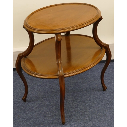 675 - An oval mahogany 2-tier occasional table on cabriole legs, 75cm wide, 75cm high