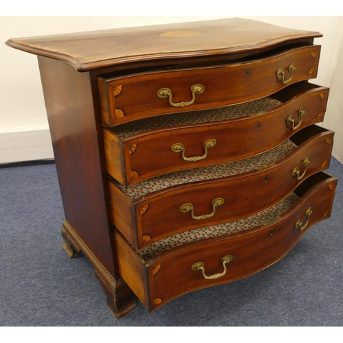 678 - A 19th Century mahogany Serpentine fronted chest of drawers with allover banded decoration and shell... 