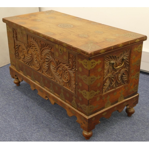 681 - A 19th Century Eastern Padouk hardwood rectangular shaped trunk with allover inlaid brass mounts and... 