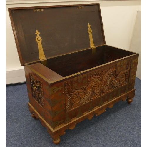 681 - A 19th Century Eastern Padouk hardwood rectangular shaped trunk with allover inlaid brass mounts and... 