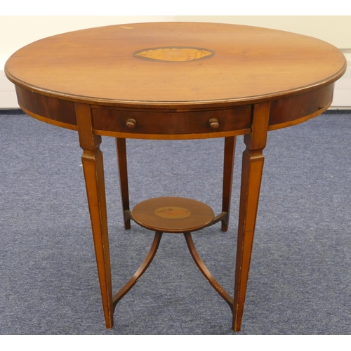 686 - A 19th Century mahogany oval occasional table with inlaid shell motif, single drawer on square taper... 