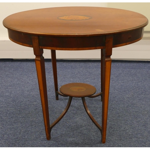 686 - A 19th Century mahogany oval occasional table with inlaid shell motif, single drawer on square taper... 