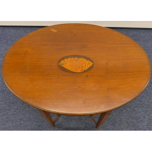 686 - A 19th Century mahogany oval occasional table with inlaid shell motif, single drawer on square taper... 