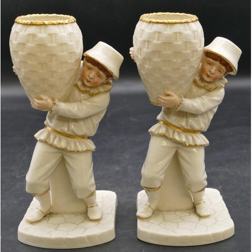 69 - A pair of 19th Century Worcester vases in the form of boys holding wicker baskets on white ground wi... 