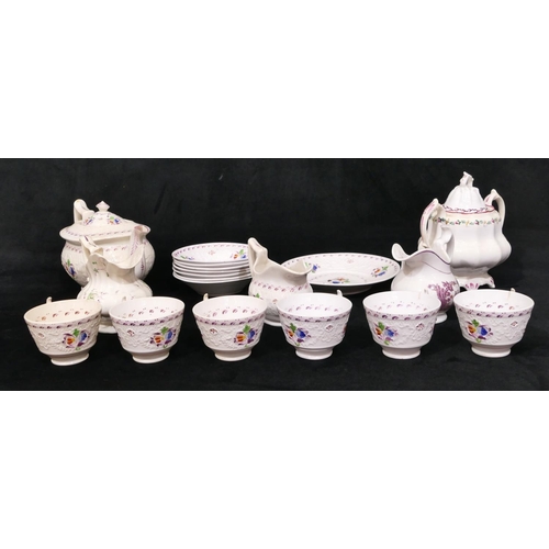 72 - A 19th Century china tea service on white ground with puce, multicoloured floral, leaf and raised de... 