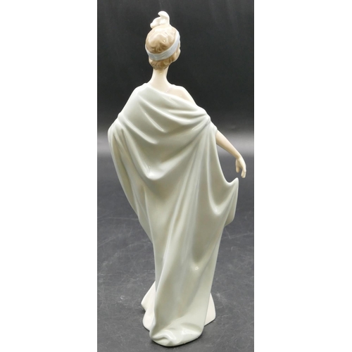 8 - A Lladro figure of a 1920's lady, 26cm high